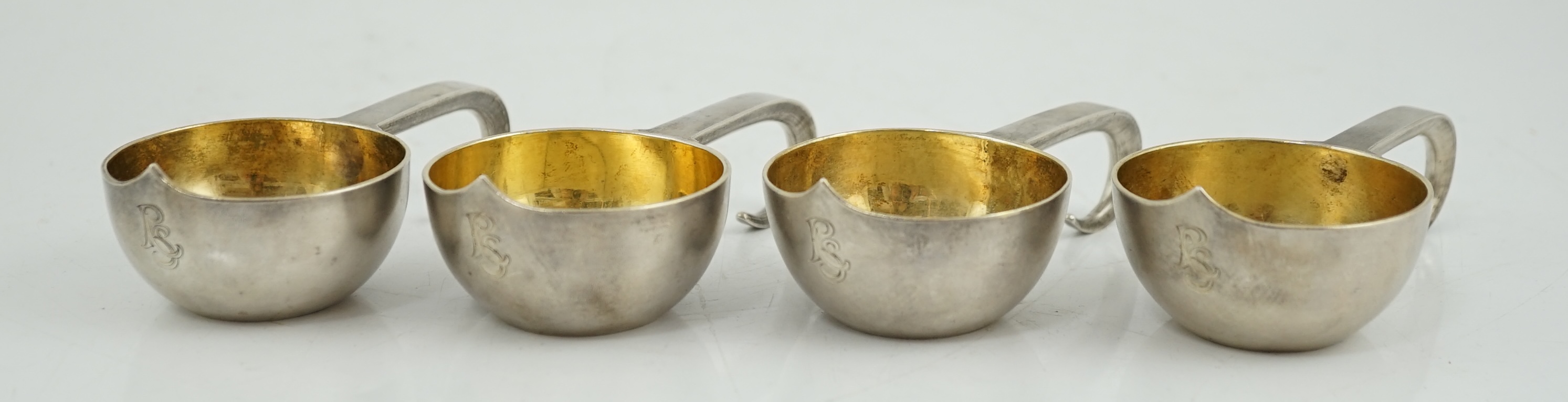 A set of four late 19th century Russian 84 zolotnik silver kovsh cups